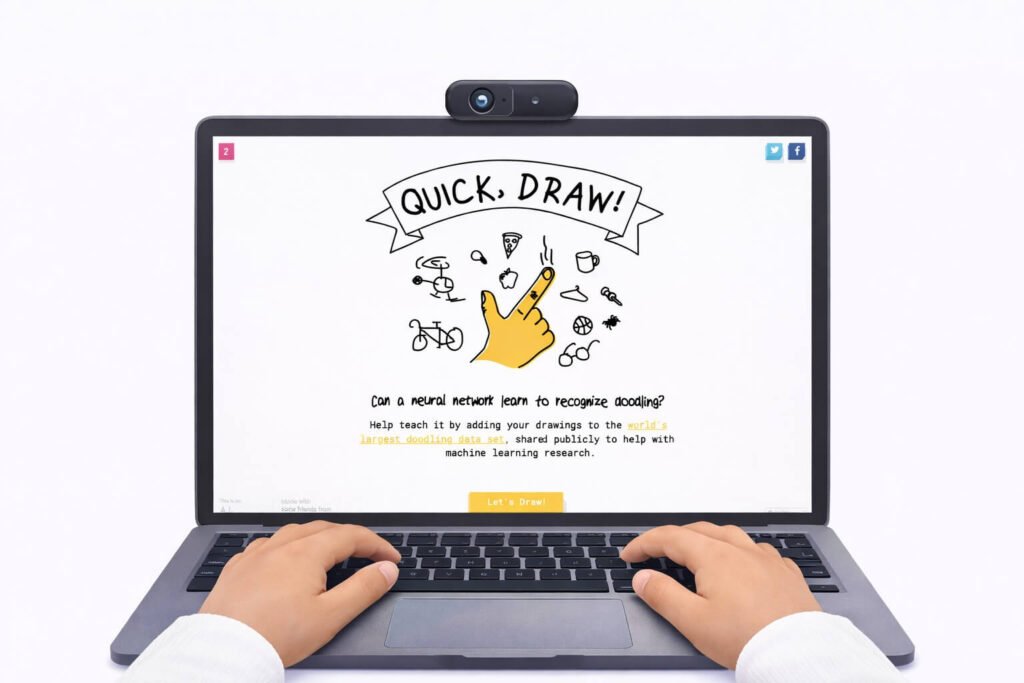 Child's hands on a laptop showing the Google Quick Draw AI doodling game homepage